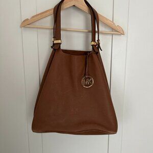 Michael Kors Tan Gold Hobo Bag with Relaxed Shape.  Some Pen Marks Inside.